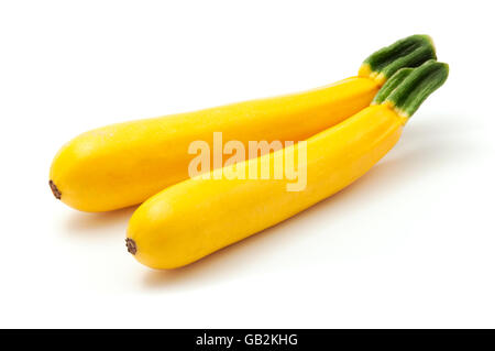 Zucchine dorate su sfondo bianco Foto Stock