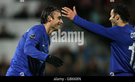 Dimitar Berbatov di Manchester United festeggia il suo 2° goal durante la Champions League, Group e match allo stadio di Aalborg, Aalborg, Danimarca. Foto Stock