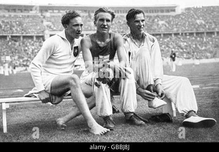 (L-R) i medalisti: Alfred Dompert (bronzo) della Germania, Volmari ISO-Hollo (oro) della Finlandia e Kaarlo Tuominen (argento) della Finlandia Foto Stock