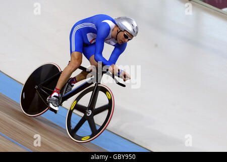 Darren Kenny della Gran Bretagna corre sulla strada per vincere Medaglia d'oro Foto Stock