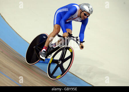 Darren Kenny della Gran Bretagna corre sulla strada per vincere Medaglia d'oro Foto Stock