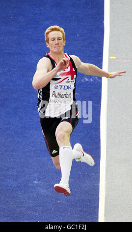 Greg Rutherford della Gran Bretagna nelle finali del Long Jump maschile durante i Campionati del mondo IAAF all'Olympiastadion, Berlino. Foto Stock