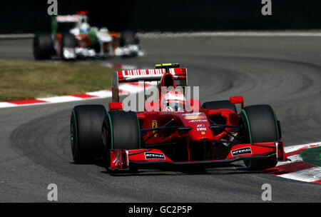 Il pilota Ferrai Kimi Raikkonen durante il Gran Premio d'Italia sul circuito di Monza. Foto Stock