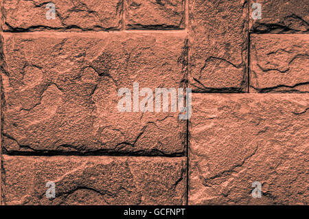 Arancione orangish grigiastro e parete di mattoni closeup Background screen-saver Foto Stock