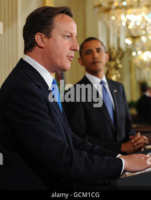 Il primo ministro David Cameron tiene una conferenza stampa con il presidente americano Barack Obama, alla Whitehouse di Washington. Foto Stock