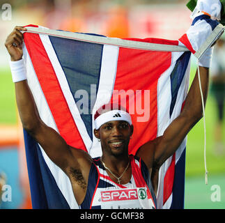 Atletica - Campionati europei IAAF 2010 - terzo giorno - Stadio Olimpico. Phillips Idowu della Gran Bretagna celebra la vittoria dell'oro nella finale del Triple Jump maschile Foto Stock