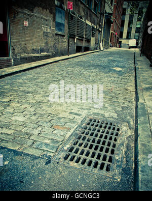 Vintage tonica immagine di vecchi vicoli in ciottoli nella città di New York Foto Stock