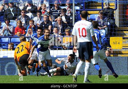 Roger Johnson (a sinistra) di Birmingham City festeggia la sua prima posizione obiettivo del gioco Foto Stock