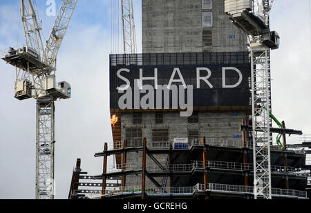 I lavori di costruzione proseguono sul progetto Shard di London Bridge, Londra. Foto Stock