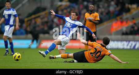 Calcio - Barclays Premier League - Wolverhampton Wanderers / Birmingham City - Molineux. Barry Ferguson di Birmingham (a sinistra) e Nenad Milijas di Wolverhampton Wanderers (a destra) in azione Foto Stock