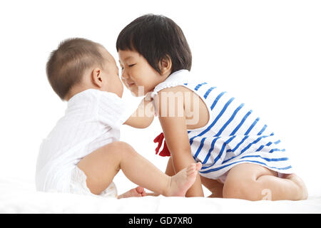 Sorella e fratello minore Foto Stock