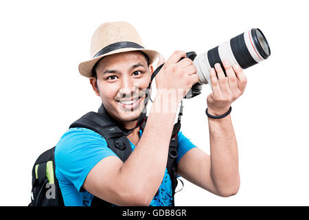 1 fotografo indiano cameraman telecamera facendo clic su fotografia immagine Foto Stock