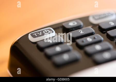 Close-up di un TV / Set top box di comando remoto Foto Stock