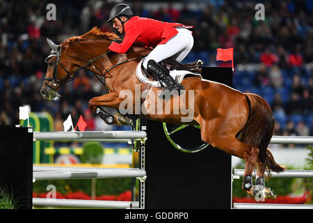 Aachen, Germania. 14 Luglio, 2016. Il tedesco mostrano il ponticello di Ludger Beerbaum in azione sul suo cavallo Casello durante le Nazioni' Cup al CHIO International Horse Show di Aachen, Germania, 14 luglio 2016. Foto: UWE ANSPACH/dpa/Alamy Live News Foto Stock