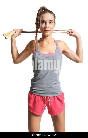 Donna Shapely esercitando con un salto con la corda. Foto Stock