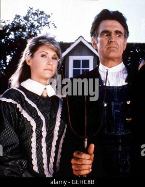 Dee Wallace Stone, Billy Green Bush Auf der Farm von Jay (Billy Green Bush) und Helen Brown (Dee Wallace Stone) sind ausserirdische Kreaturen gelandet, die aus einem galaktischen Gefaengnis ausgebrochen sind. *** Caption locale *** 1986, Critters, Critte Foto Stock