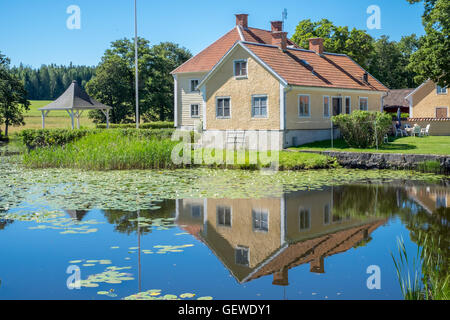 Brevens bruk - una piccola e antica ferriera company town in Svezia Foto Stock