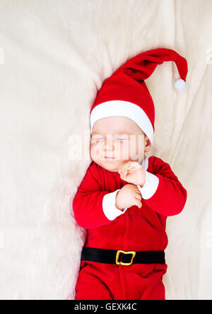 Il bambino dorme nella santa costume Foto Stock