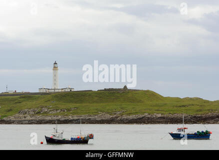 Il Rinns di Islay Faro sulla piccola isola di Orsay. Portnahaven, Islay, Ebridi Interne, Argyll, Scotland, Regno Unito. Foto Stock