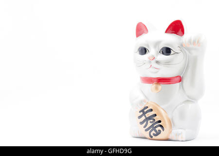 Giapponese indicandovi argento cat chiamato Manekineko noto anche come una Gatta Fortunata Foto Stock