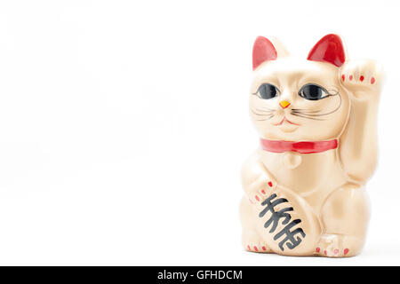 Giapponese golden indicandovi chiamato cat Manekineko noto anche come una Gatta Fortunata Foto Stock