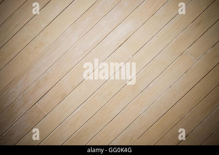 Legno laminato parete texture di sfondo, centro, Spotlight scurisce edge, modello diagonale Foto Stock