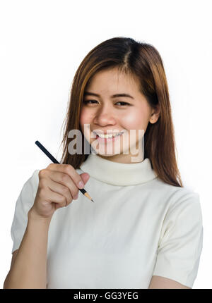 Bellezza ragazza asiatica per iscritto con la matita nera isolata su uno sfondo bianco. Foto Stock