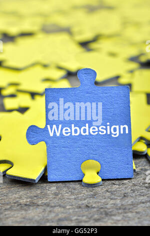 I pezzi del puzzle con la parola Webdesign Foto Stock