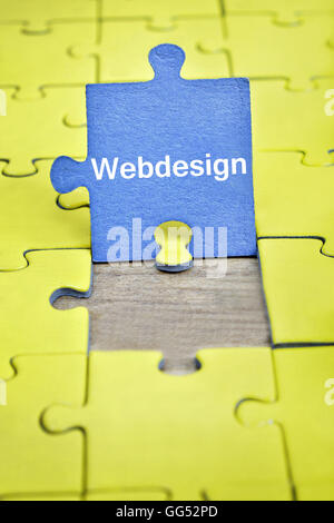 I pezzi del puzzle con la parola Webdesign Foto Stock