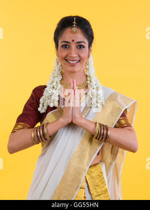 Sud donna indiana saluto Foto Stock