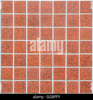 Mosaico di moderno rosso piastrelle in ceramica con piazze e bordo bianco in forma rettangolare Foto Stock