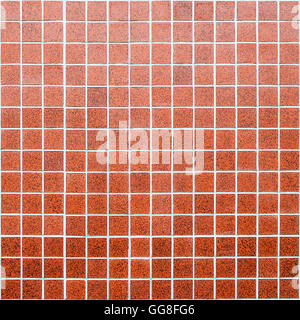 Mosaico di moderno rosso piastrelle in ceramica con piazze e bordo bianco in forma rettangolare Foto Stock