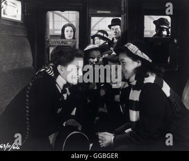 BACKGROUND / UK 1953 / Daniel Birt scena con VALERIE HOBSON MANDY MILLER, PHILIP AMICO (in background) e Janette Scott (sinistra) Regie: Daniel Birt Foto Stock