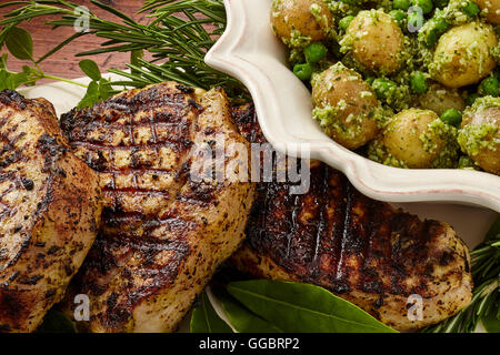 La carne di maiale patate Piselli Foto Stock