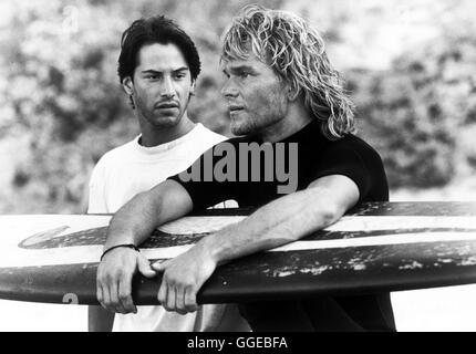 GEFÄHRLICHE BRANDUNG / rottura del punto USA 1991 / Kathryn Bigelow Szene mit Undercover-Agent Johnny Utah (Keanu Reeves) und Surfer Bodhi (Patrick Swayze). Regie: Kathryn Bigelow aka. Rottura del punto Foto Stock