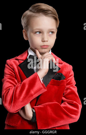 Grave little boy in uno smoking Foto Stock