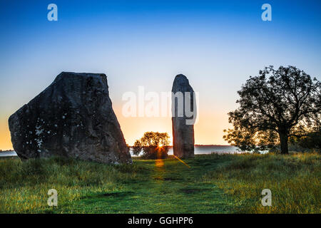 Sarsen le pietre a sunrise in Avebury, Wiltshire. Foto Stock