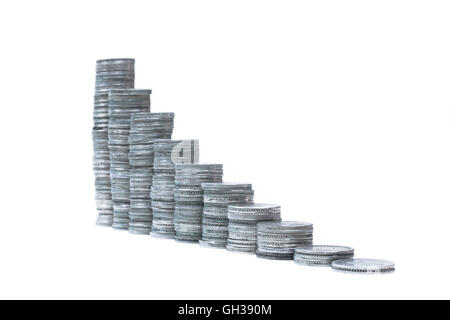 Un grafico di salita fatta di monete d'argento. Foto Stock