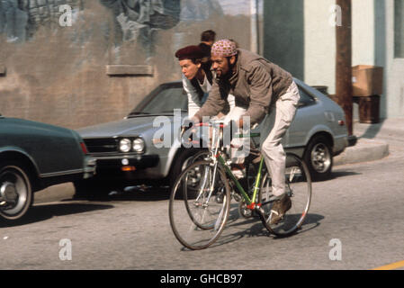 QUICKSILVER USA 1986 Thomas Michael Donnelly Kevin Bacon (Jack Casey) e Laurence Fishburne (Voodoo) Godetevi la libertà e lo sport agonistico della bicicletta messengering. Regie: Thomas Michael Donnelly Foto Stock