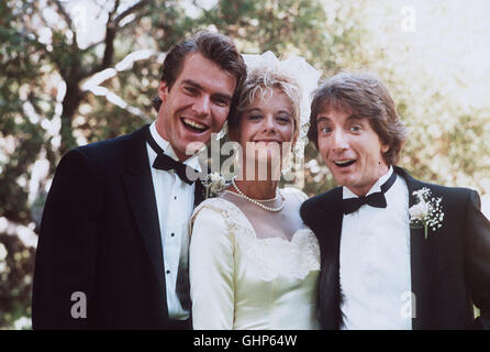 Testpilot Tuck Pendelton (Dennis Quaid, l.) gelangt durch eine geheime Versuchsreihe versehentlich in den Körper des Verkäufers gestreßten Jack Putter (Martin Short). Foto mit inserimenti Freundin Lydia Maxwell (MEG RYAN). Regie: Joe Dante aka. Innerspace Foto Stock