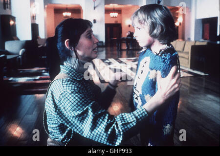 Shining - Der Schriftsteller erfolglose Jack Torrance übernimmt einen Job als Hausmeister im menschenleeren und eingeschneiten 'si affacciano sull'-Hotel. Auf dem haus scheint ein Fluch zu Lasten, der allmählich Jack in den Wahnsinn treibt. Er greift zur Axt und versucht, seine Frau Wendy (SHELLEY DUVALL) und seinen Sohn Danny (DANNY LLOYD) zu ermorden... Regie: Stanley Kubrick aka. Il luminoso: Nach einem Roman von Stephen King Foto Stock