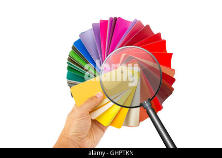 Rainbow tavolozza di colori con lente di ingrandimento, isolato su bianco Foto Stock