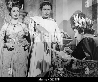 QUO VADIS?- Feldherr Marcus Vinicius kehrt im Triumphzug nach Rom zurück. Auf dem Wege lernt er die als Geisel festgehaltene Königstochter Lygia kennen. Als Belohnung für seine Leistungen militärischen erhält er die Freiheit für Lygia. Er erfährt, dass sie zu der in Rom religione verbotenen der Christen gehört. Nero verfolgt indes-sen seine Wahnidee, Rom abzubrennen und als Neue Stadt Neropolis aufzubauen... PATRICIA LAFFAN - Poppäa Leo Genn - Petronio Peter Ustinov - Kaiser nero Regie: Mervyn Leroy aka. Quo Vadis Foto Stock