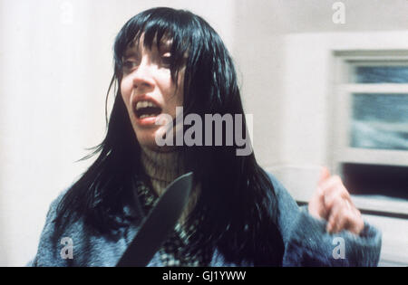 SHINING- Der Schriftsteller erfolglose Jack Torrance übernimmt einen Job als Hausmeister im menschenleeren und eingeschneiten 'si affacciano sull'-Hotel. Auf dem haus scheint ein Fluch zu Lasten, der allmählich Jack in den Wahnsinn treibt. Er greift zur Axt und versucht, seine Frau Wendy (SHELLEY DUVALL) und seinen Sohn Danny zu ermorden... Regie: Stanley Kubrick aka. La splendente/ Nach einem Roman von Stephen King Foto Stock