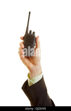 La radio in mano di un uomo come un concetto di comunicazione Foto Stock