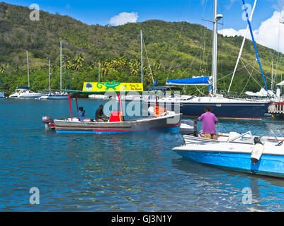 Dh Porto di Marigot Bay St Lucia Caraibi Caraibi acqua taxi traghetto per il Dottor Dolittle beach boat people holiday Foto Stock