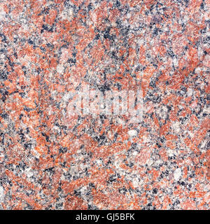 Rosso naturale a chiazze texture di granito come sfondo Foto Stock