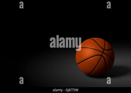 3D rendering del basket ball su sfondo nero. Foto Stock