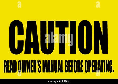 Il simbolo di attenzione la consulenza leggere il manuale di istruzioni prima di azionare, scrittura in nero su sfondo giallo Foto Stock