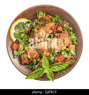 Chakhokhbili stufato di pollo con i pomodori e le erbe isolato Foto Stock